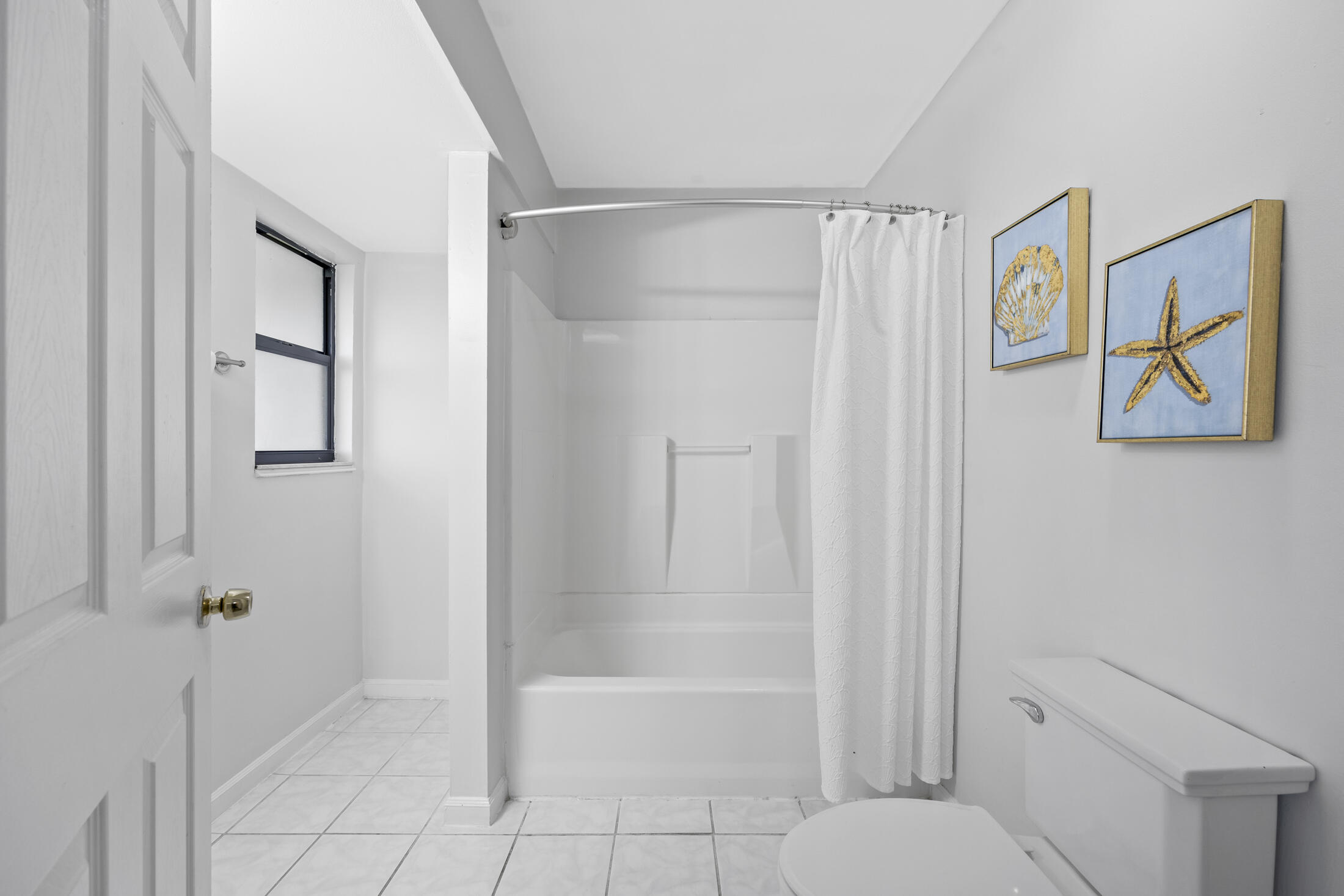 1180 Mascot Street Northeast Palm Bay, FL 32905 - Photo 15 of 24 a bathroom with a shower and a toilet