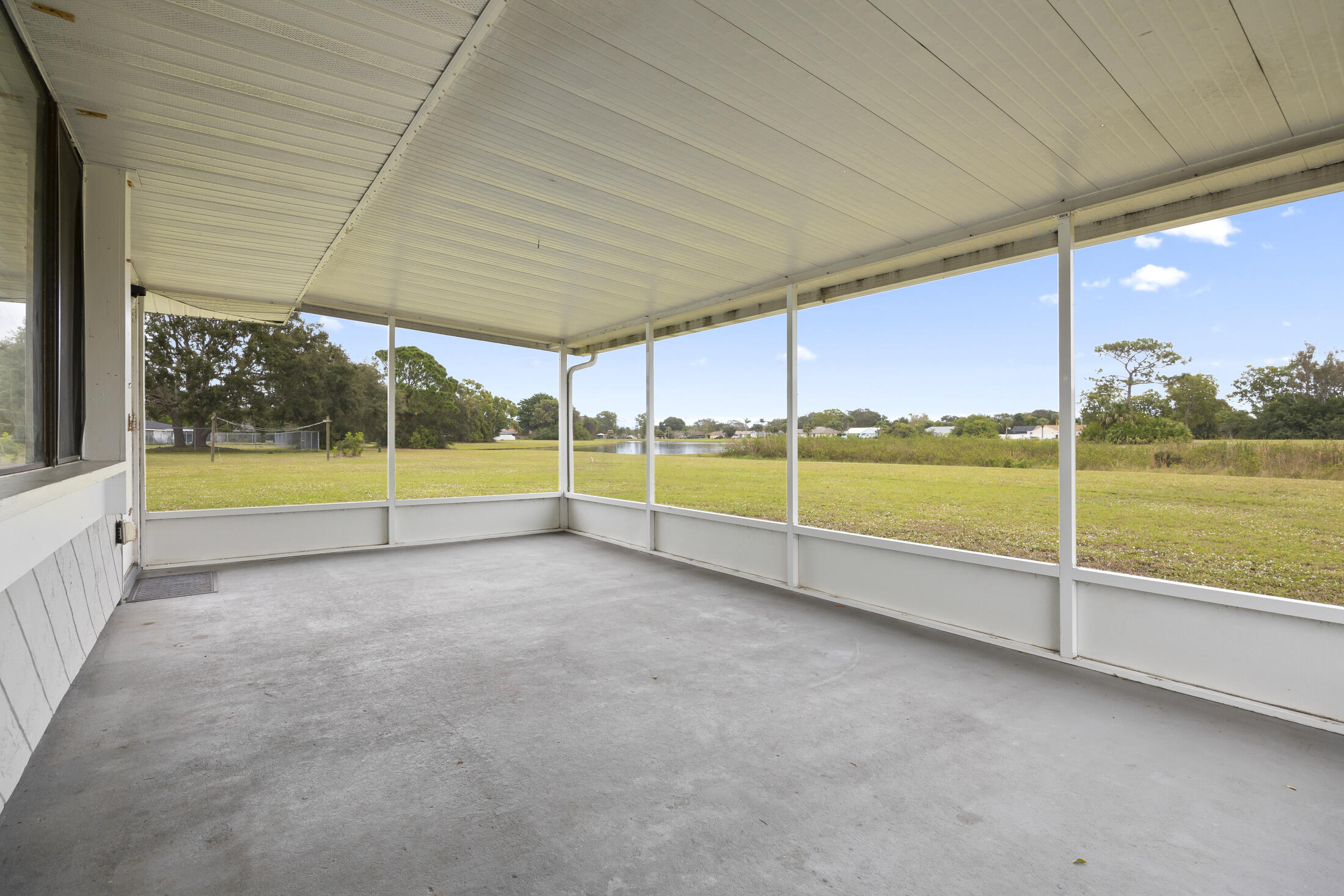1180 Mascot Street Northeast Palm Bay, FL 32905 - Photo 21 of 24 a view of an empty room with a large window