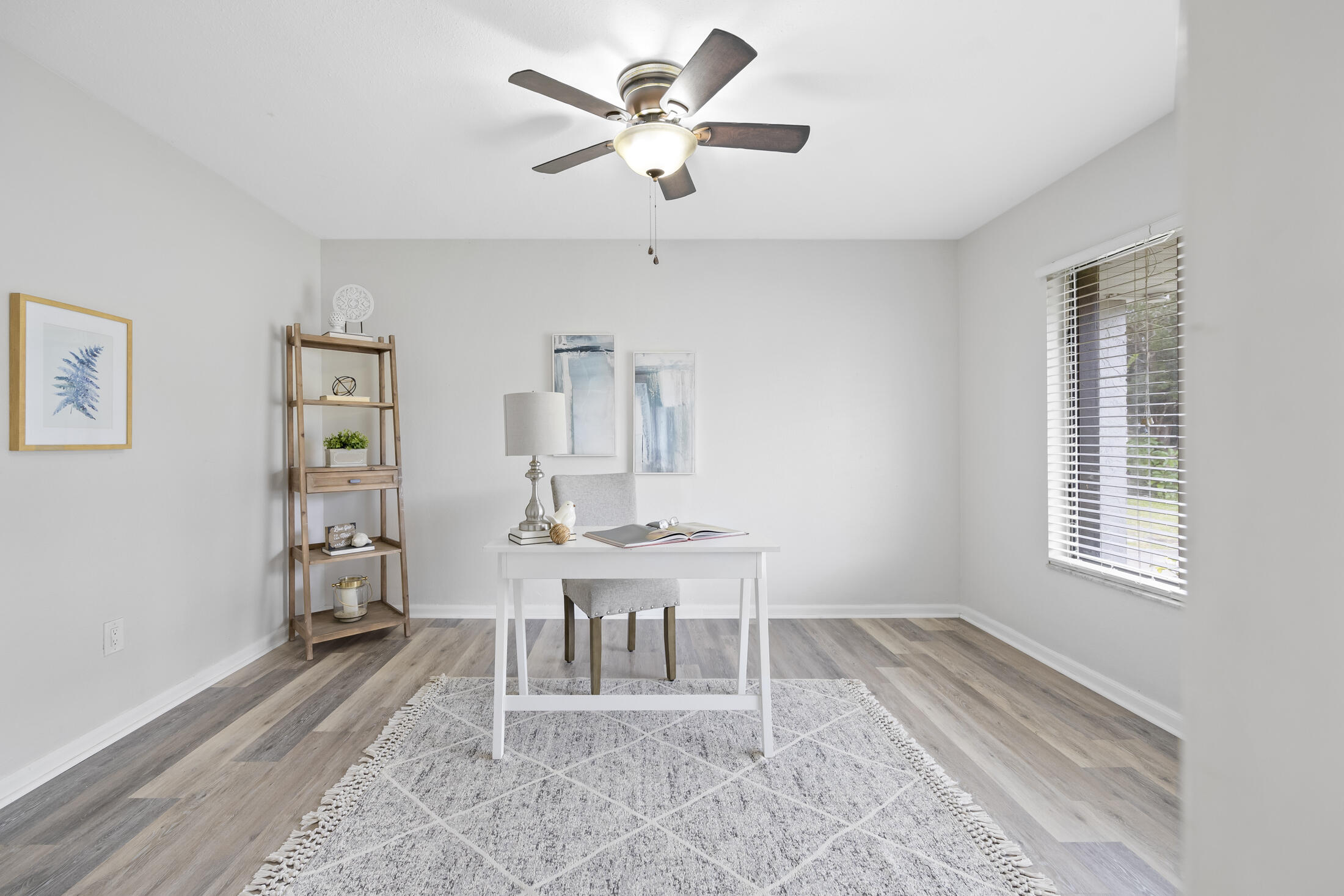 1180 Mascot Street Northeast Palm Bay, FL 32905 - Photo 4 of 24 a living room with furniture a window and a chandelier