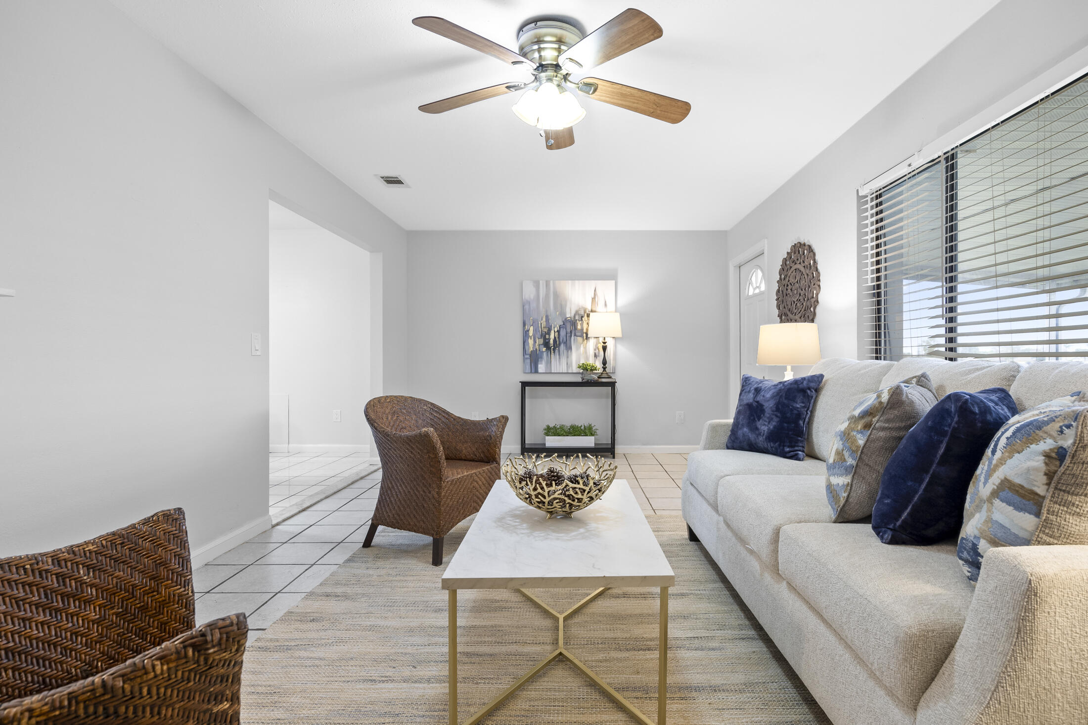 1180 Mascot Street Northeast Palm Bay, FL 32905 - Photo 10 of 24 a living room with furniture and a large window