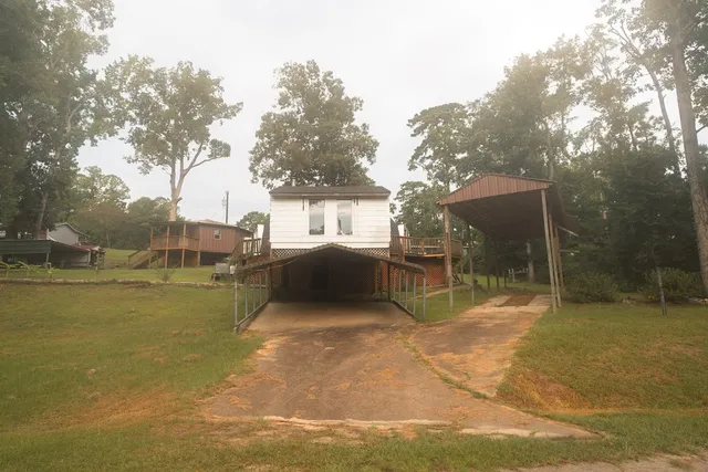 a view of a chairs and table in the patio