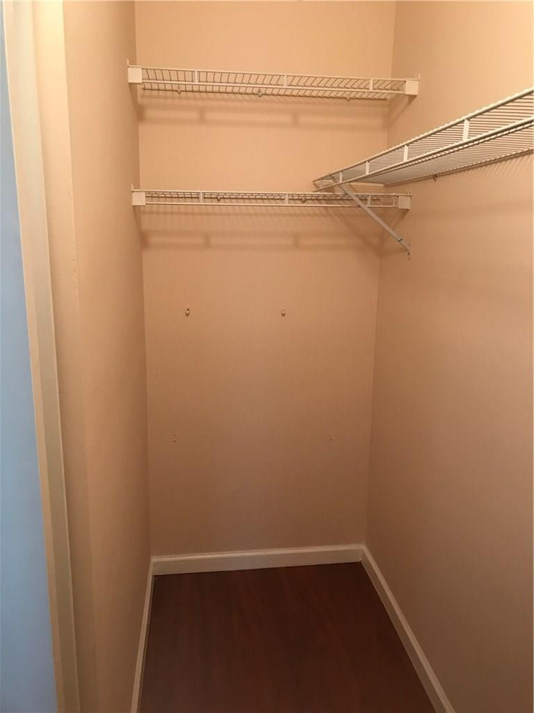 5980 West Sample Road, Unit 305 Coral Springs, FL 33067 - Photo 21 of 24 Master Bedroom walking closet