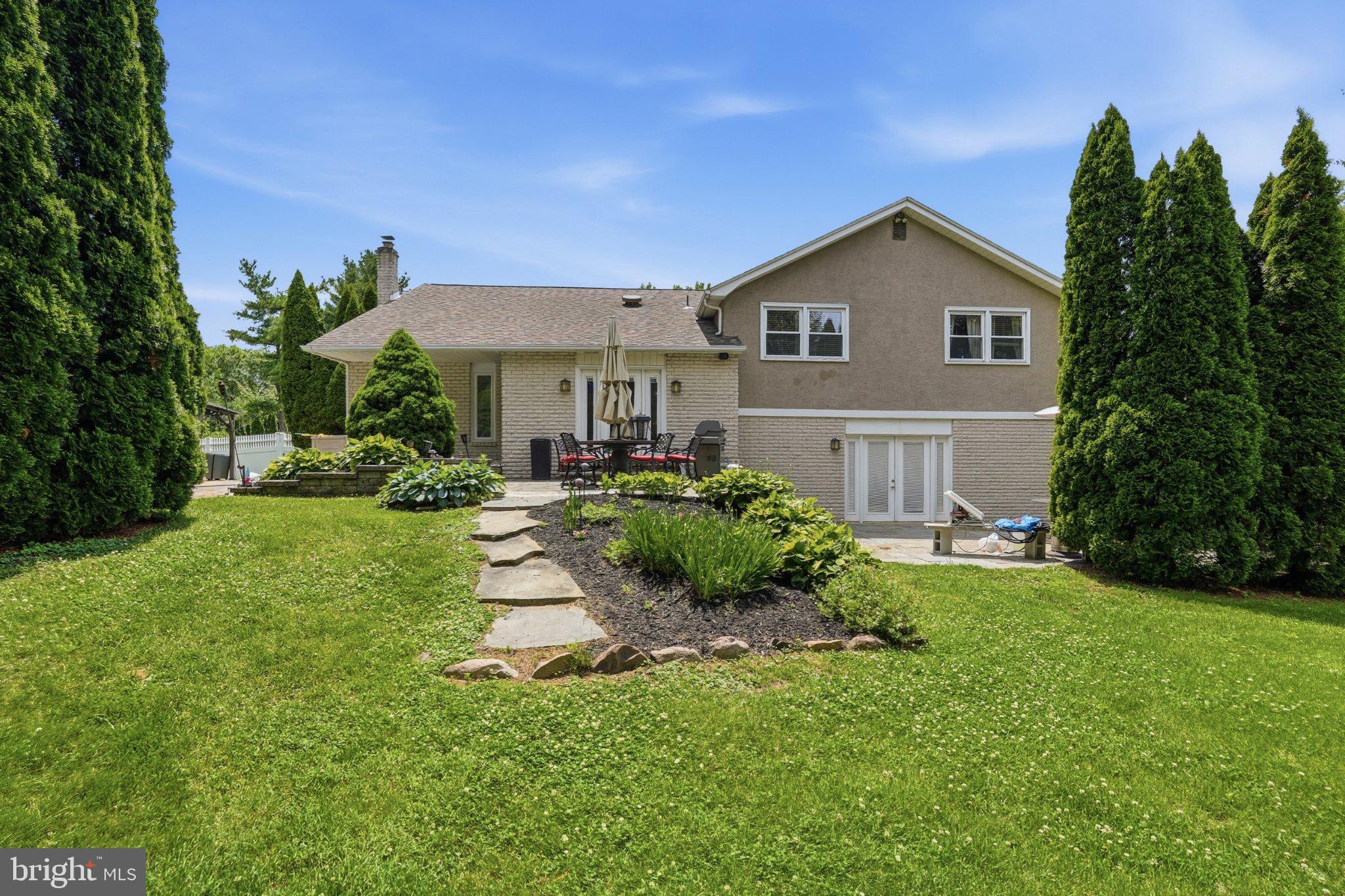 1002 Tannerie Run Road Ambler, PA 19002 - Photo 66 of 67 Charming home with lush greenery.