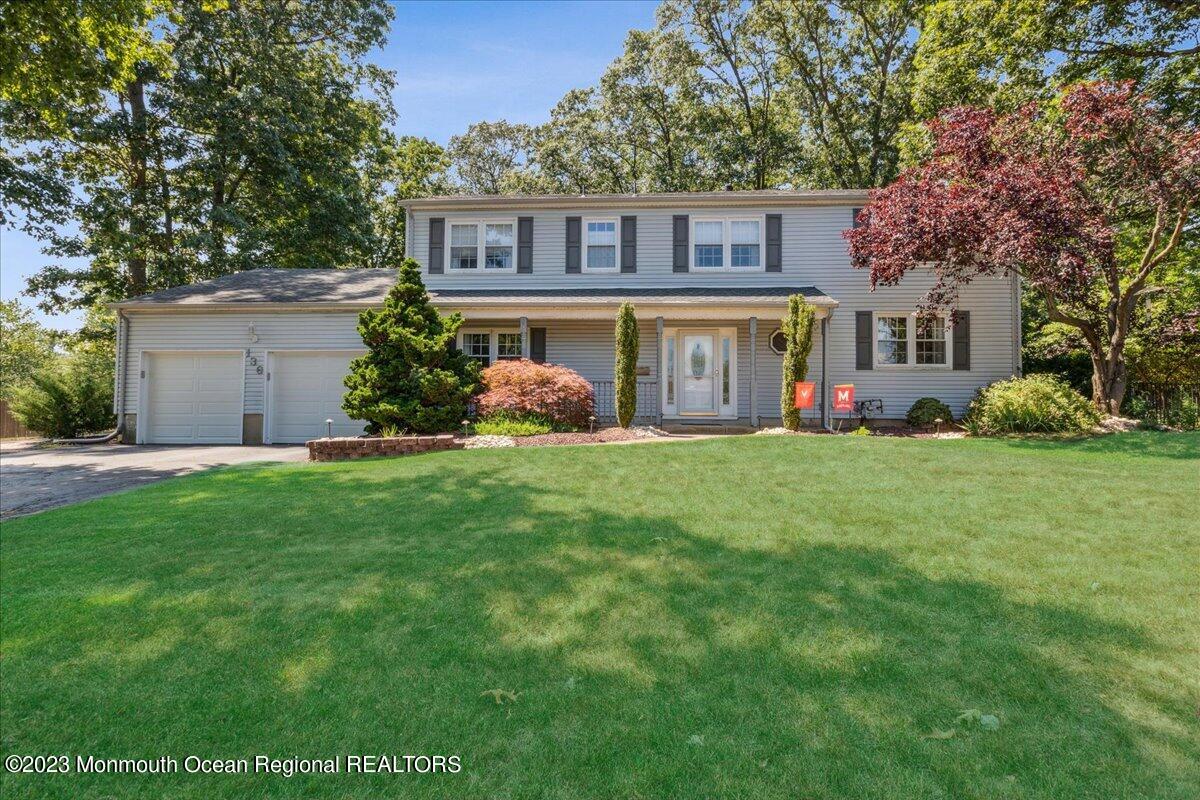 136 Lancaster Road Freehold, NJ 07728 - Photo 1 of 44 a front view of house with yard and green space