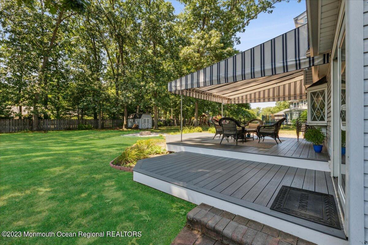 136 Lancaster Road Freehold, NJ 07728 - Photo 34 of 44 a view of a swimming pool with a patio