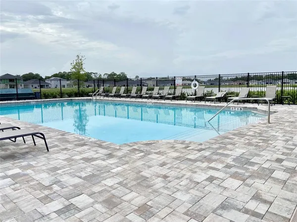 a view of a terrace with sitting area