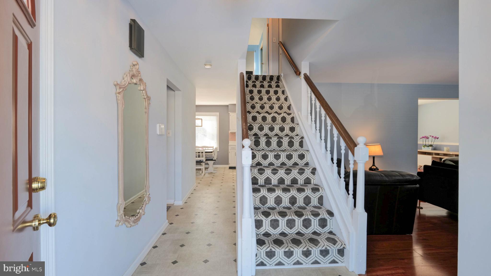 68 Wayside Road Berlin, NJ 08009 - Photo 3 of 31 a view of a hallway with wooden floor and entryway