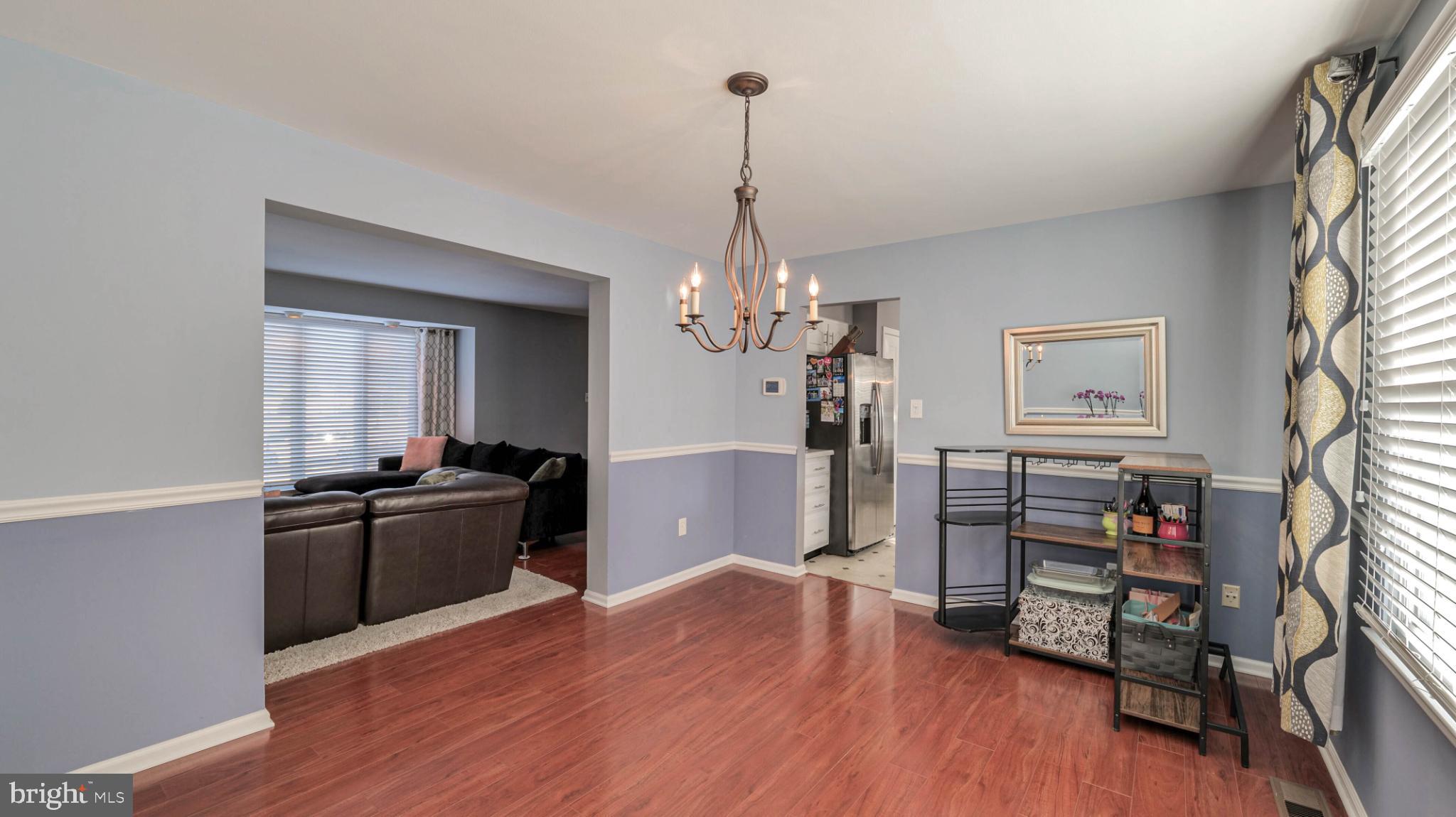 68 Wayside Road Berlin, NJ 08009 - Photo 9 of 31 a kitchen with stainless steel appliances granite countertop a refrigerator and a stove top oven
