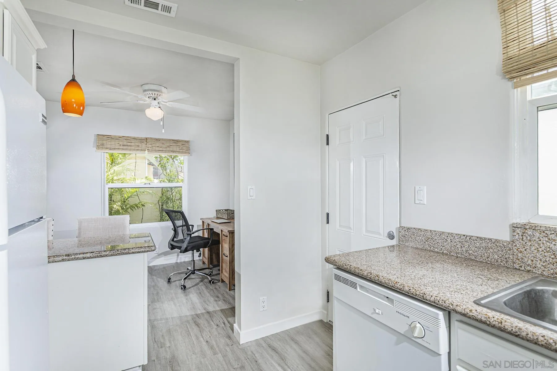 804 Vanderbilt Place San Diego, CA 92103 - Photo 13 of 18 a living room with granite countertop furniture and a fireplace