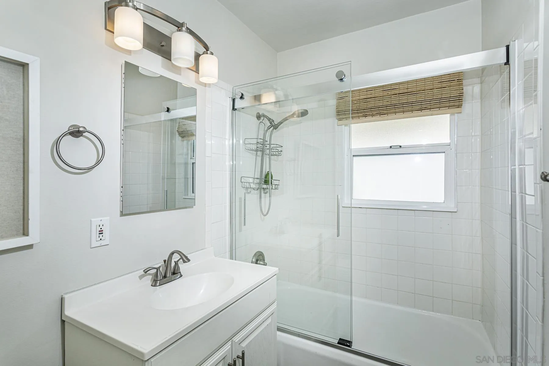 804 Vanderbilt Place San Diego, CA 92103 - Photo 15 of 18 a bathroom with a sink toilet and shower