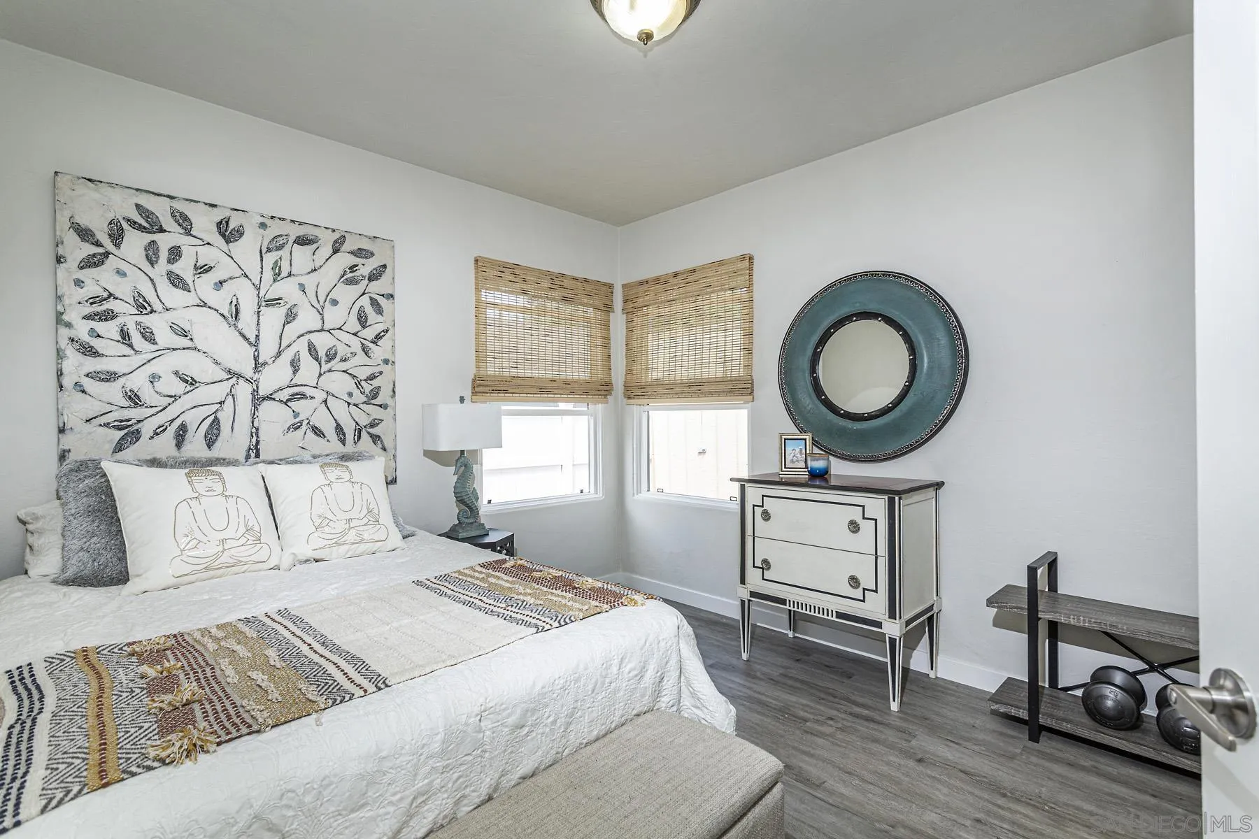 804 Vanderbilt Place San Diego, CA 92103 - Photo 16 of 18 a bedroom with a bed cabinets and window