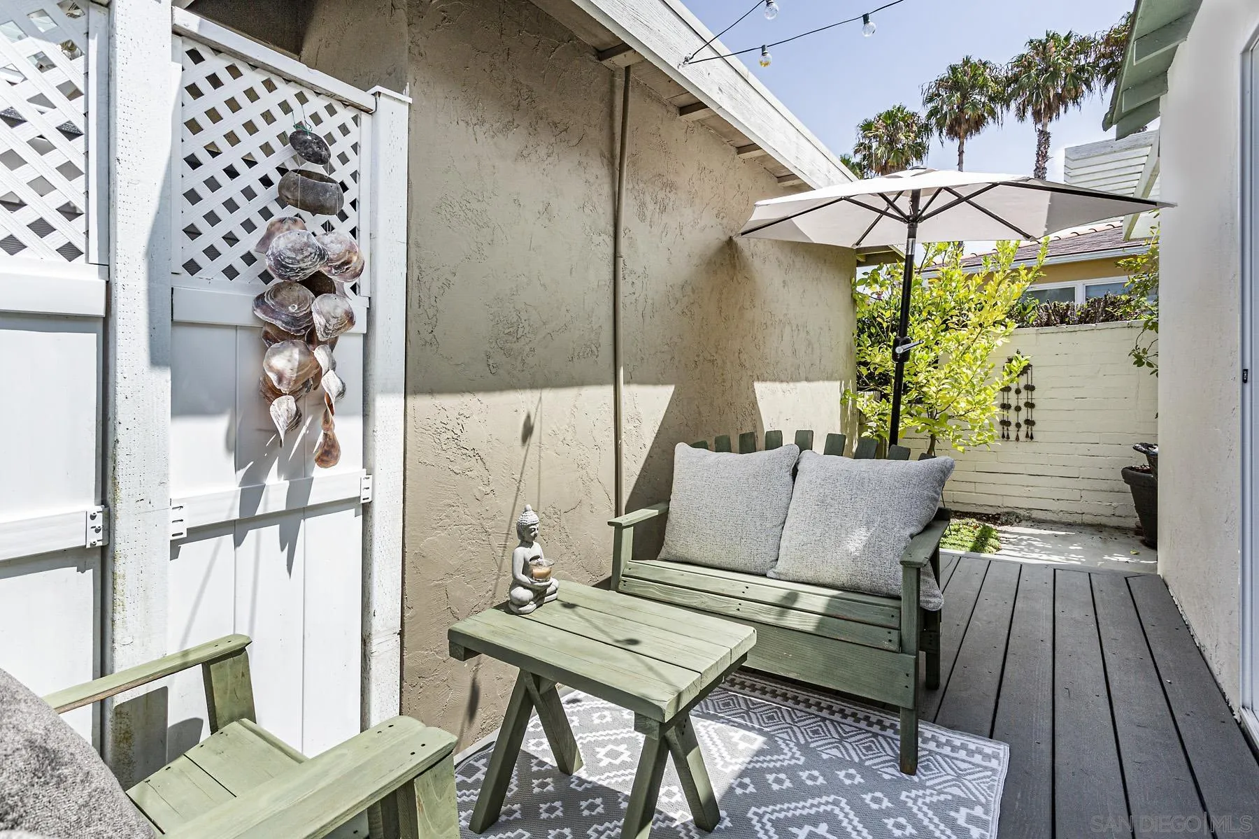 804 Vanderbilt Place San Diego, CA 92103 - Photo 18 of 18 a balcony with furniture and a potted plant