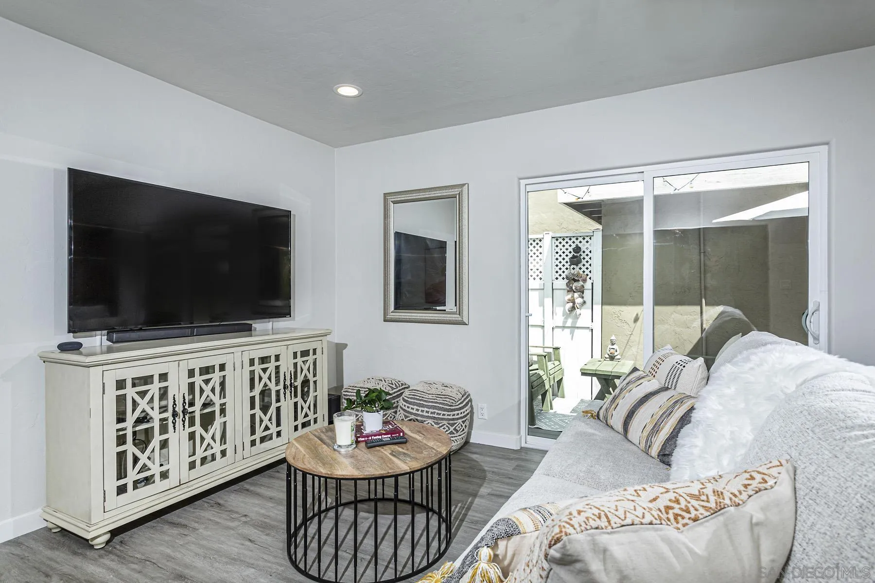 804 Vanderbilt Place San Diego, CA 92103 - Photo 9 of 18 a living room with furniture and a flat screen tv