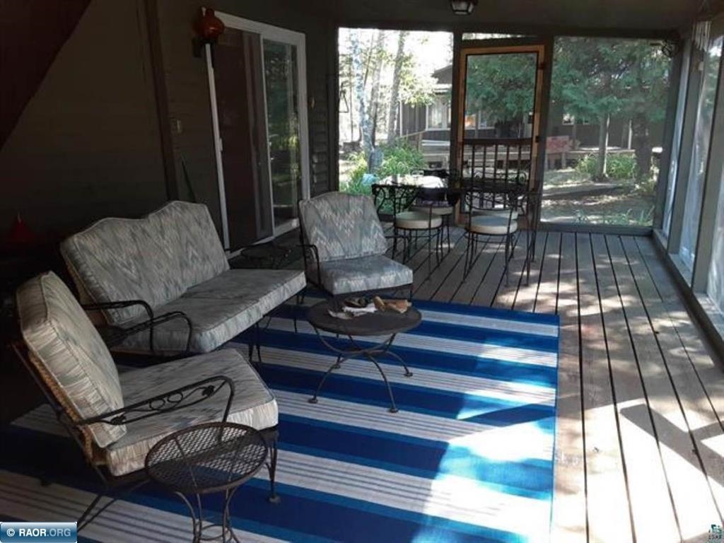 7228 Mercer Island Cook, MN 55723 - Photo 4 of 39 Relaxing in the Porch