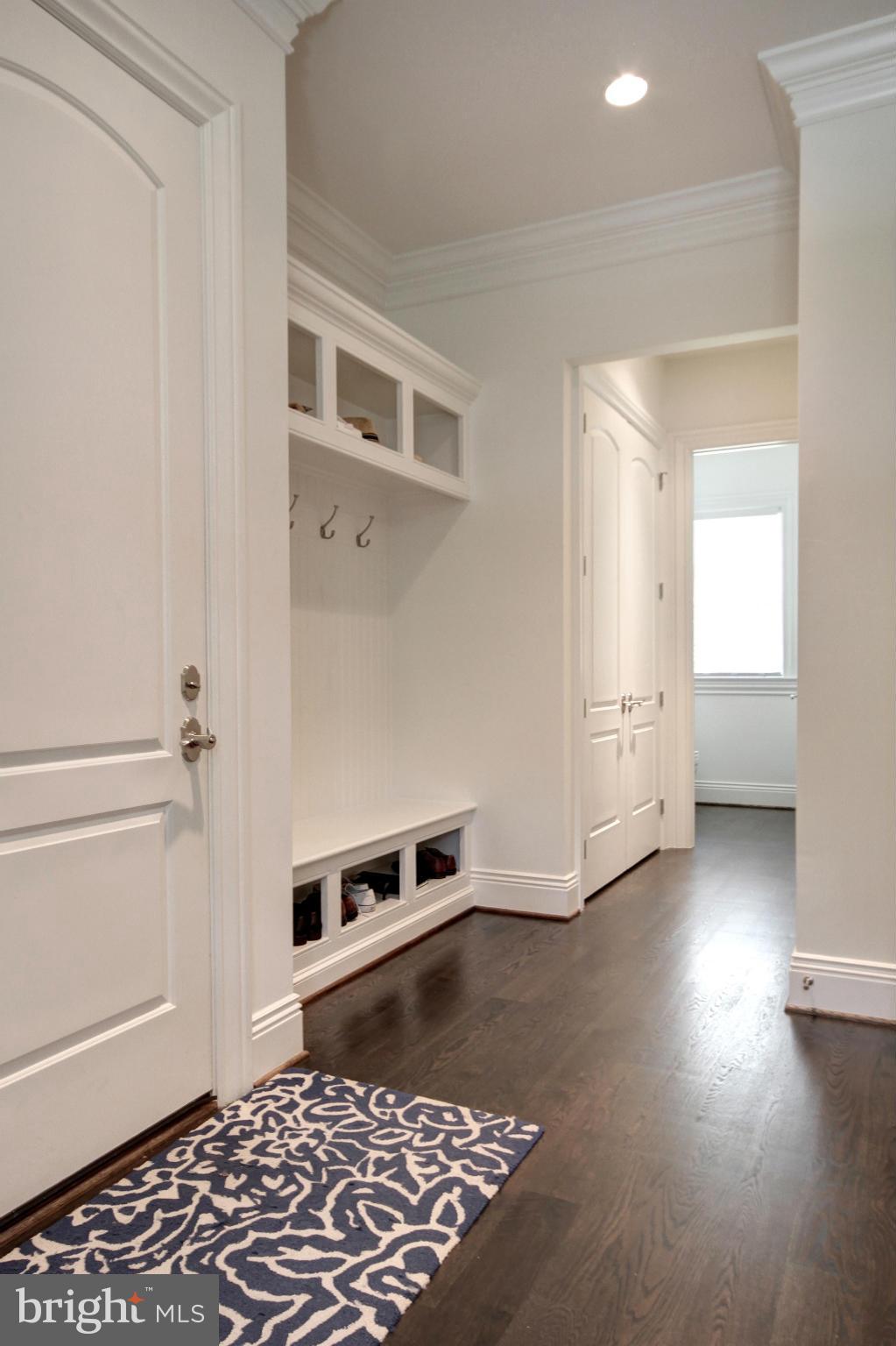 448 Springvale Road Great Falls, VA 22066 - Photo 14 of 30 a view of a hallway with entryway with wooden floor