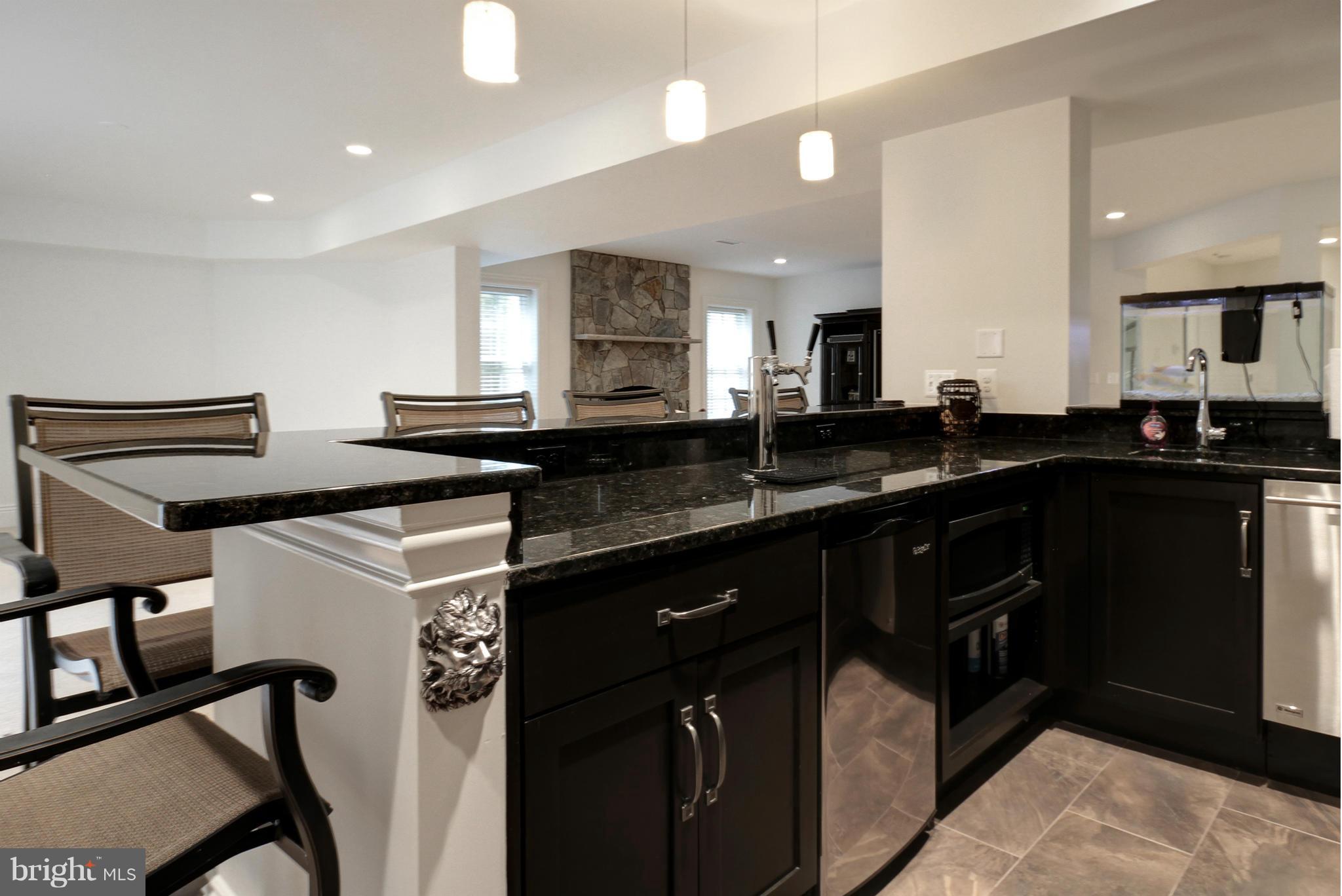 448 Springvale Road Great Falls, VA 22066 - Photo 27 of 30 a kitchen with a sink and cabinets