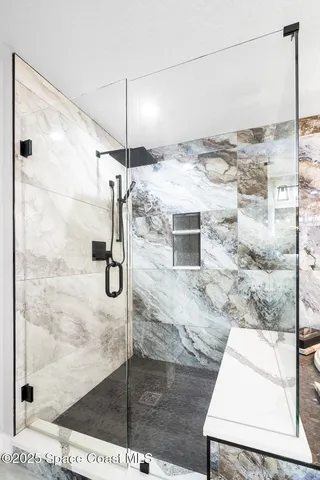 a view of water heater room with furniture