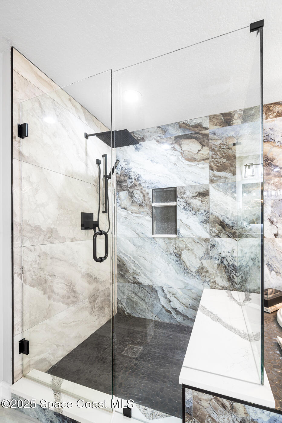 480 Sail Lane, Unit 703 Merritt Island, FL 32953 - Photo 32 of 41 a bathroom with a shower