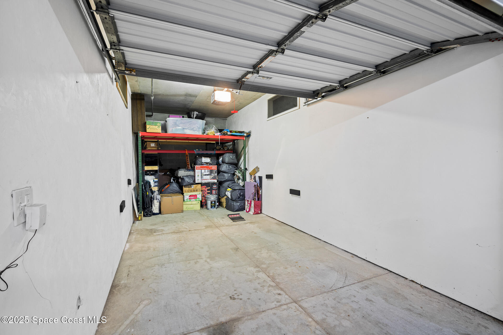 480 Sail Lane, Unit 703 Merritt Island, FL 32953 - Photo 34 of 41 a view of water heater room with furniture