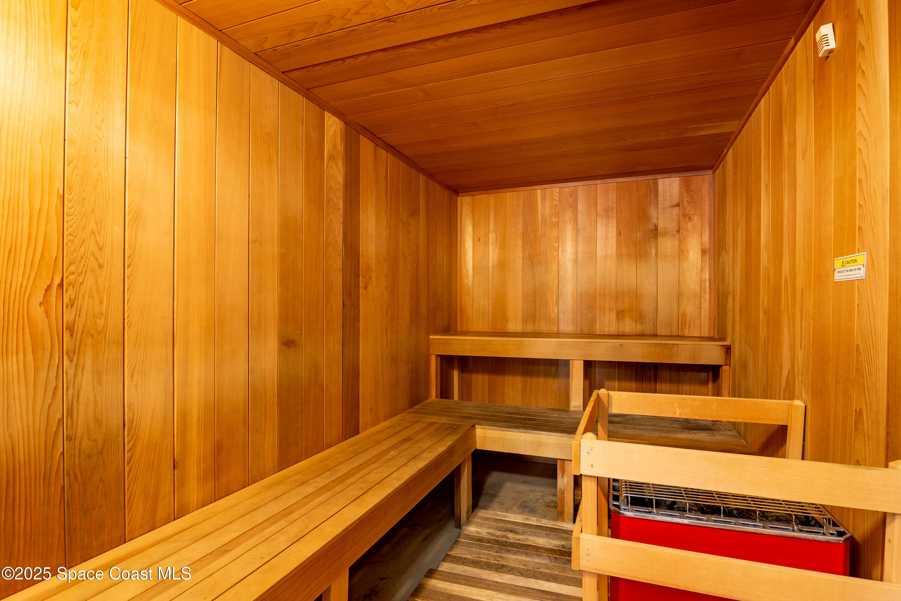 480 Sail Lane, Unit 703 Merritt Island, FL 32953 - Photo 35 of 41 a bathroom with a sink and a shower curtain