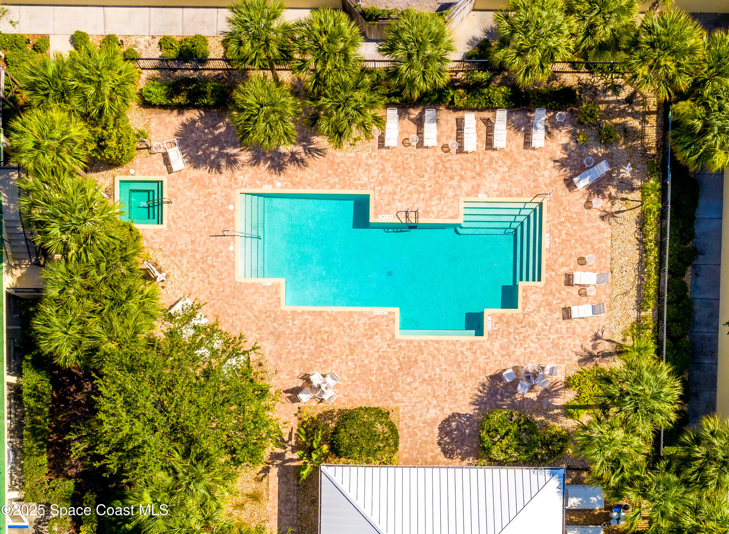 480 Sail Lane, Unit 703 Merritt Island, FL 32953 - Photo 37 of 41 front view of a house with a yard