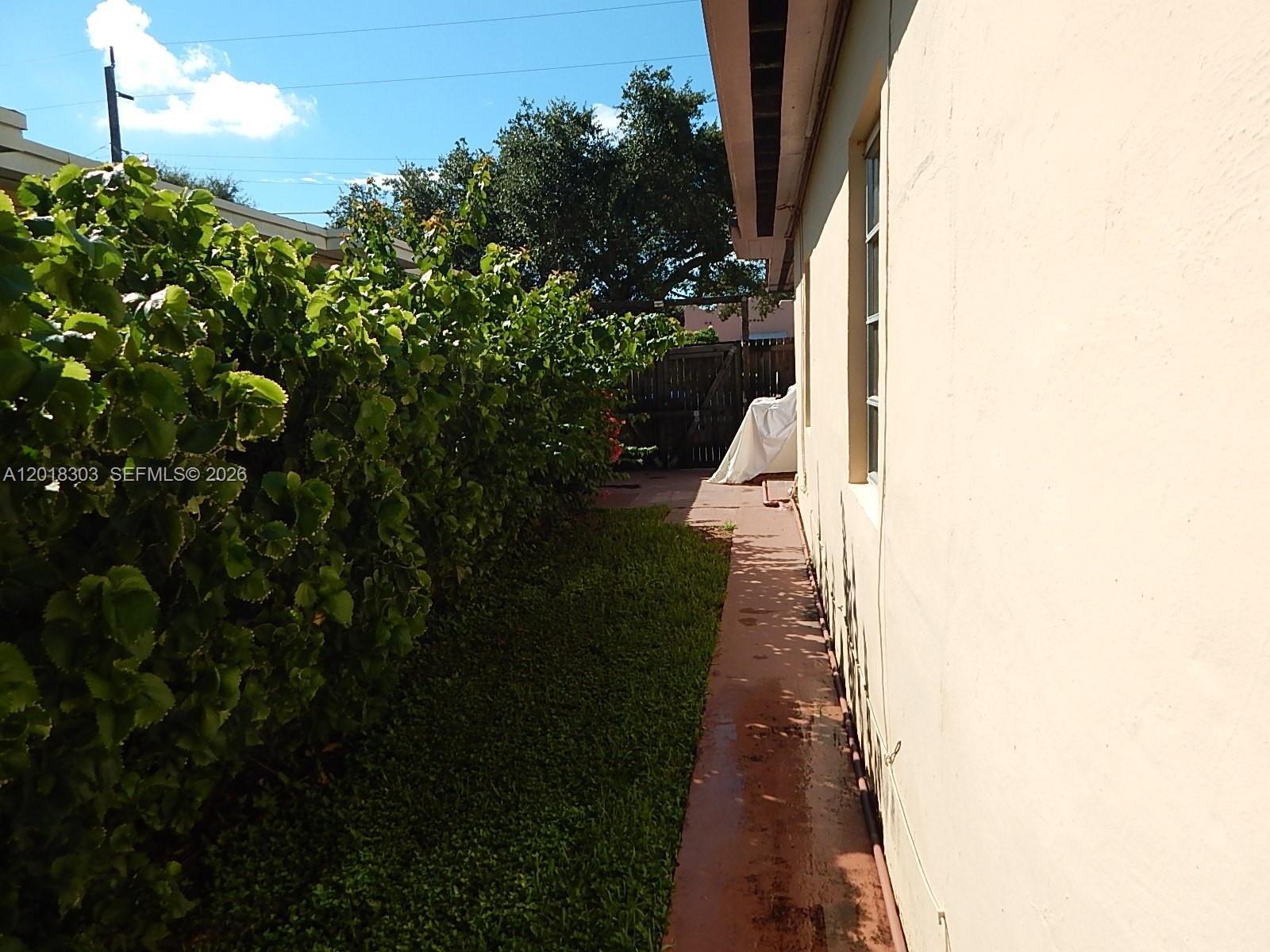 3671 Southwest 24th Street, Unit 2 Miami, FL 33145 - Photo 6 of 11 Side yard