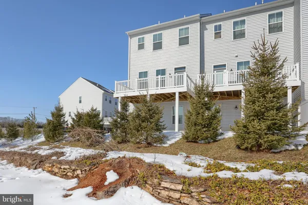 a view of a building with a yard