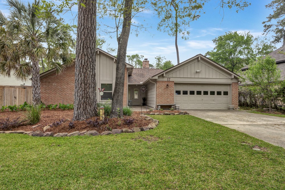 17 Wishbonebush Road Spring, TX 77380 - Photo 2 of 36 a front view of a house with garden