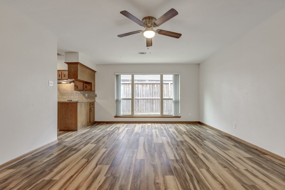 17 Wishbonebush Road Spring, TX 77380 - Photo 32 of 36 wooden floor in an empty room with a window