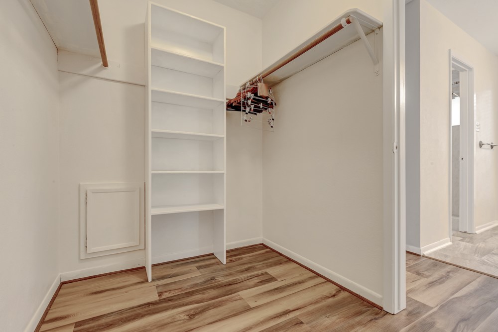 17 Wishbonebush Road Spring, TX 77380 - Photo 10 of 36 a view of an empty room with wooden floor and closet