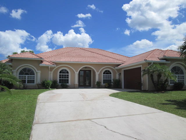 3003 Southeast Wake Road Port St. Lucie, FL 34984 - Photo 1 of 24 front