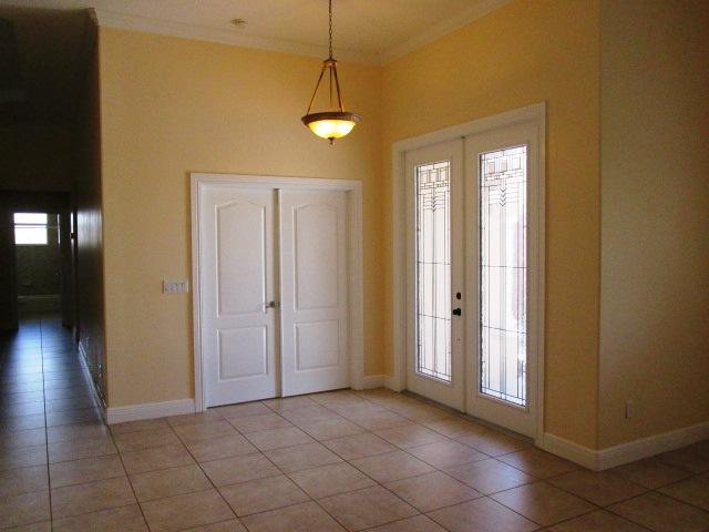 3003 Southeast Wake Road Port St. Lucie, FL 34984 - Photo 2 of 24 entry to double door den