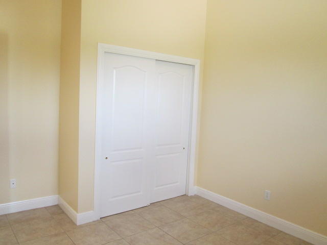 3003 Southeast Wake Road Port St. Lucie, FL 34984 - Photo 8 of 24 den closet