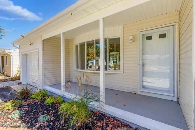 front view of a house with a small porch