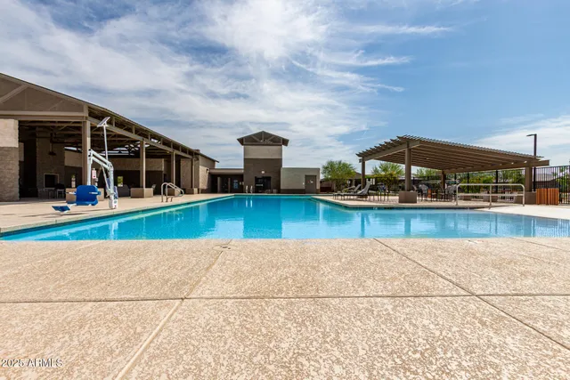 a view of house with yard and entertaining space