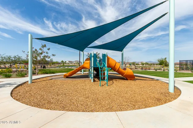 a view of a park with swings