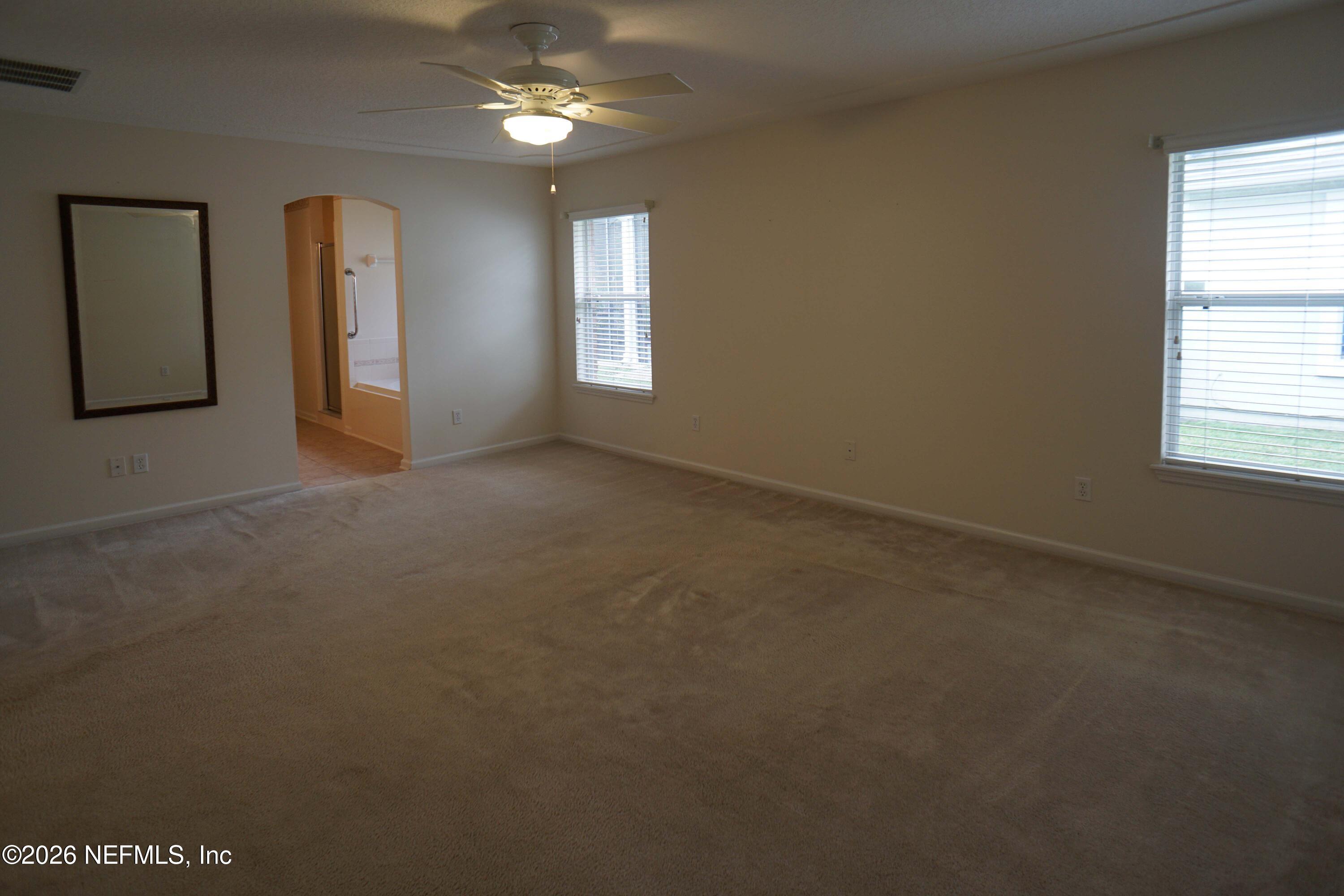 1721 Keswick Road St. Augustine, FL 32084 - Photo 8 of 17 an empty room that has a window