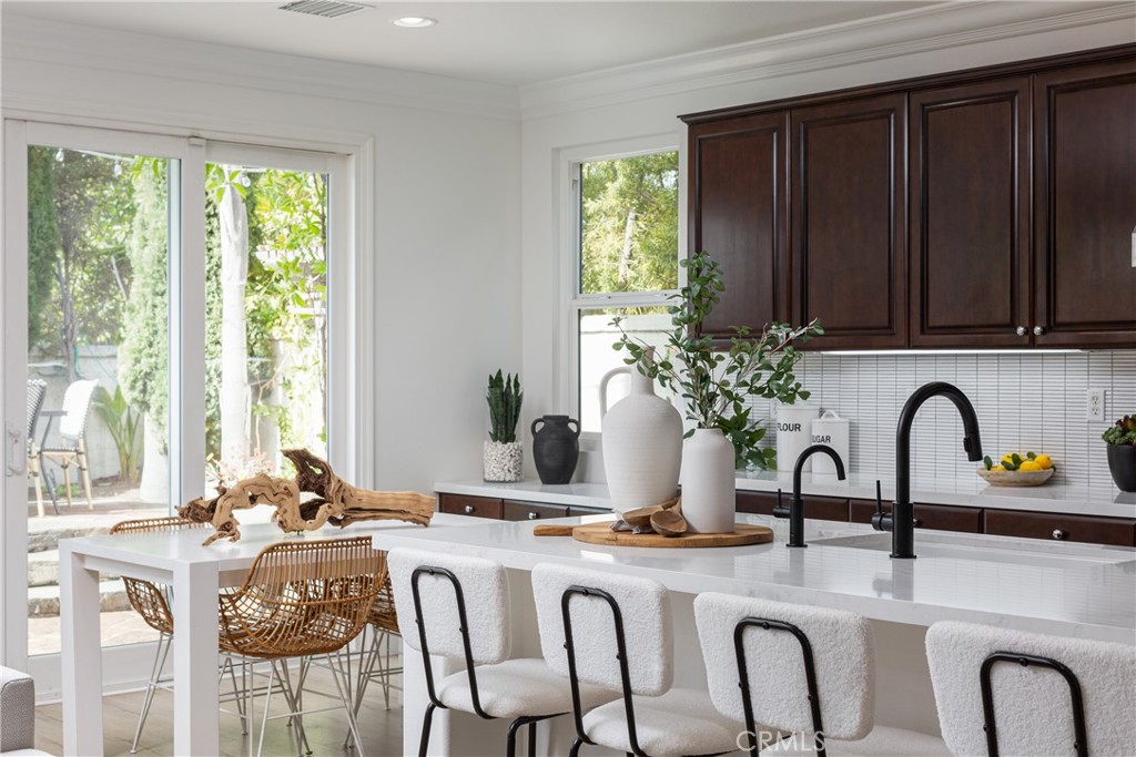 308 Via Los Tilos San Clemente, CA 92673 - Photo 11 of 43 a view of a dining table with furniture and window