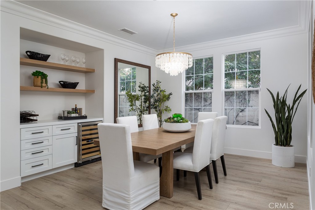 308 Via Los Tilos San Clemente, CA 92673 - Photo 15 of 43 a view of a dining room with furniture window and wooden floor
