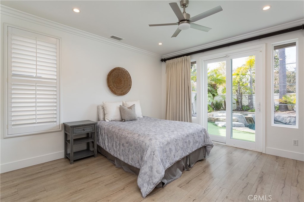 308 Via Los Tilos San Clemente, CA 92673 - Photo 17 of 43 a bedroom with a large bed and a large window