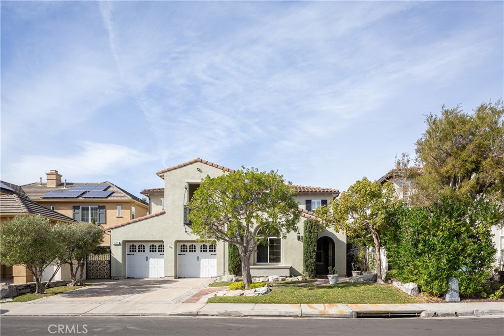 308 Via Los Tilos San Clemente, CA 92673 - Photo 2 of 43 a view of a big house in a big yard with large trees
