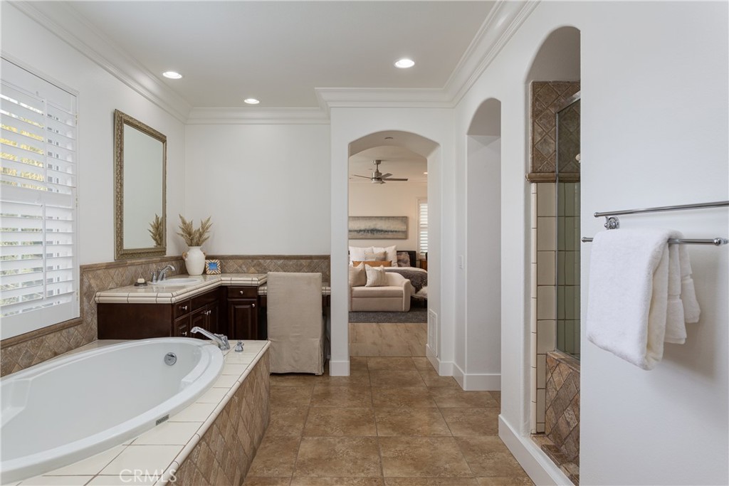 308 Via Los Tilos San Clemente, CA 92673 - Photo 23 of 43 a spacious bathroom with a tub sink and mirror