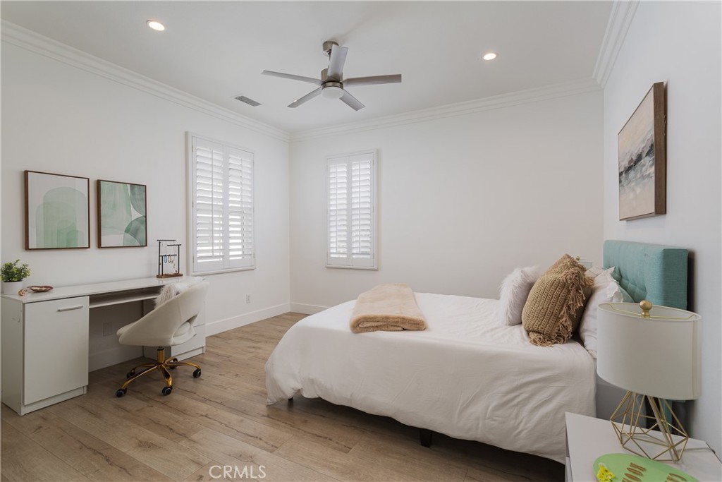 308 Via Los Tilos San Clemente, CA 92673 - Photo 25 of 43 a bedroom with a bed a table and a dresser