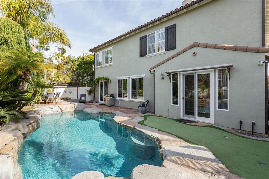 308 Via Los Tilos San Clemente, CA 92673 - Photo 33 of 43 a view of a house with backyard sitting area and garden