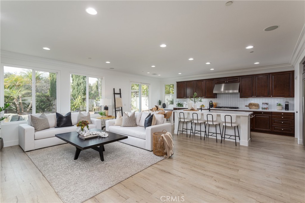 308 Via Los Tilos San Clemente, CA 92673 - Photo 5 of 43 a living room with stainless steel appliances furniture and a wooden floor