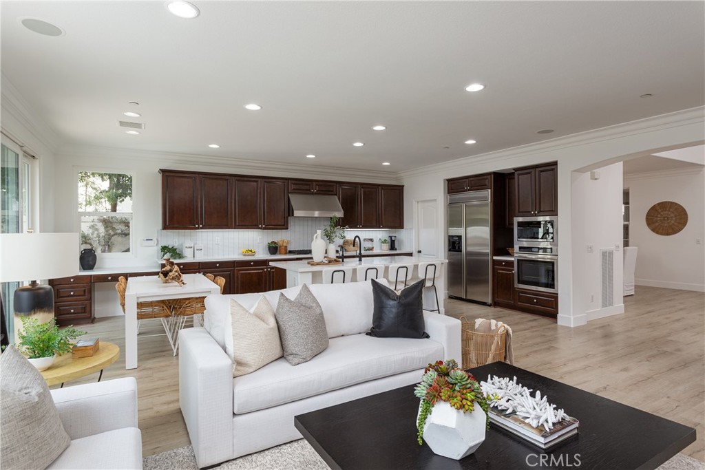 308 Via Los Tilos San Clemente, CA 92673 - Photo 7 of 43 a living room with furniture kitchen and a table