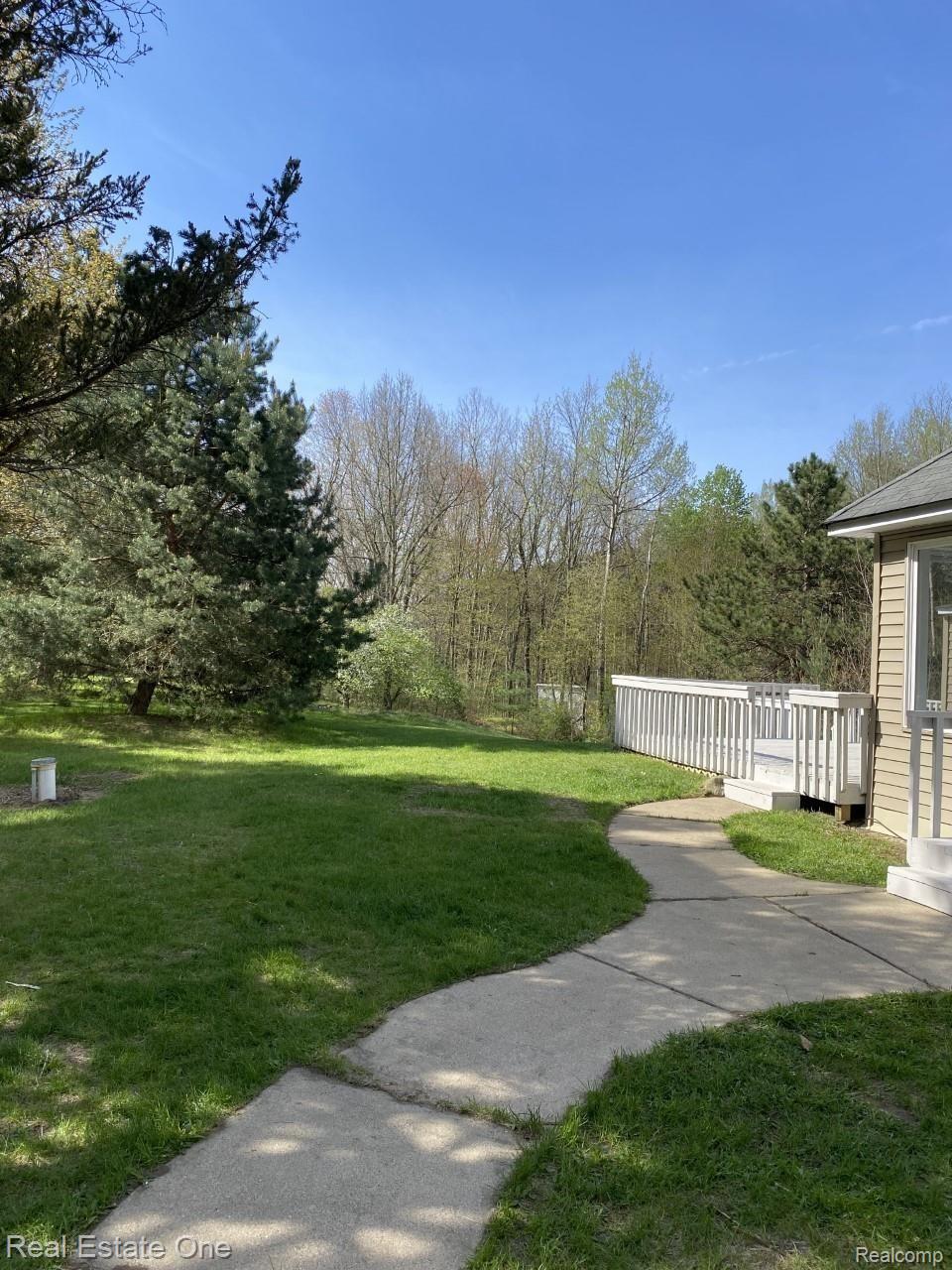3147 Roods Lake Road Lapeer, MI 48446 - Photo 39 of 66 house yard 1.jpg