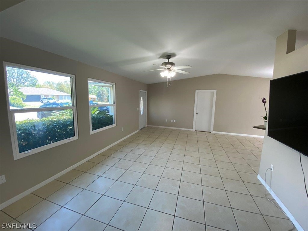 18258 Maple Road Fort Myers, FL 33967 - Photo 10 of 14 a view of an empty room with a window