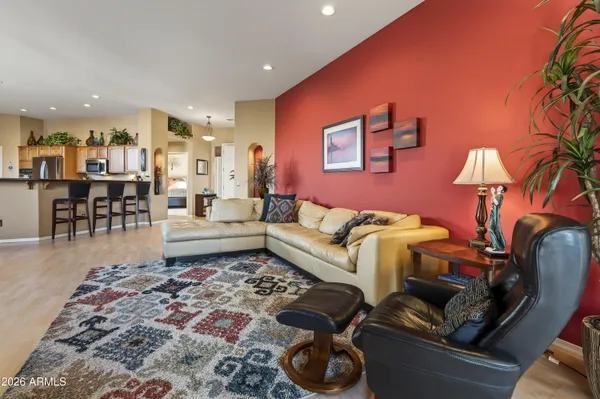 a living room with furniture and a couch