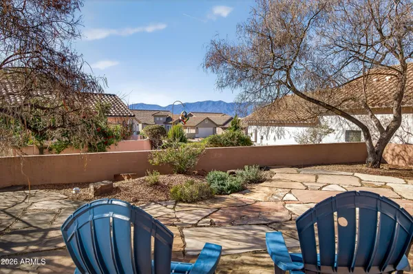a view of balcony with wooden floor